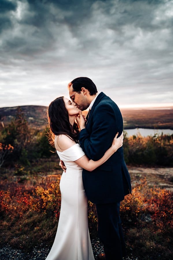 Bride and groom on cadillac mountain maine