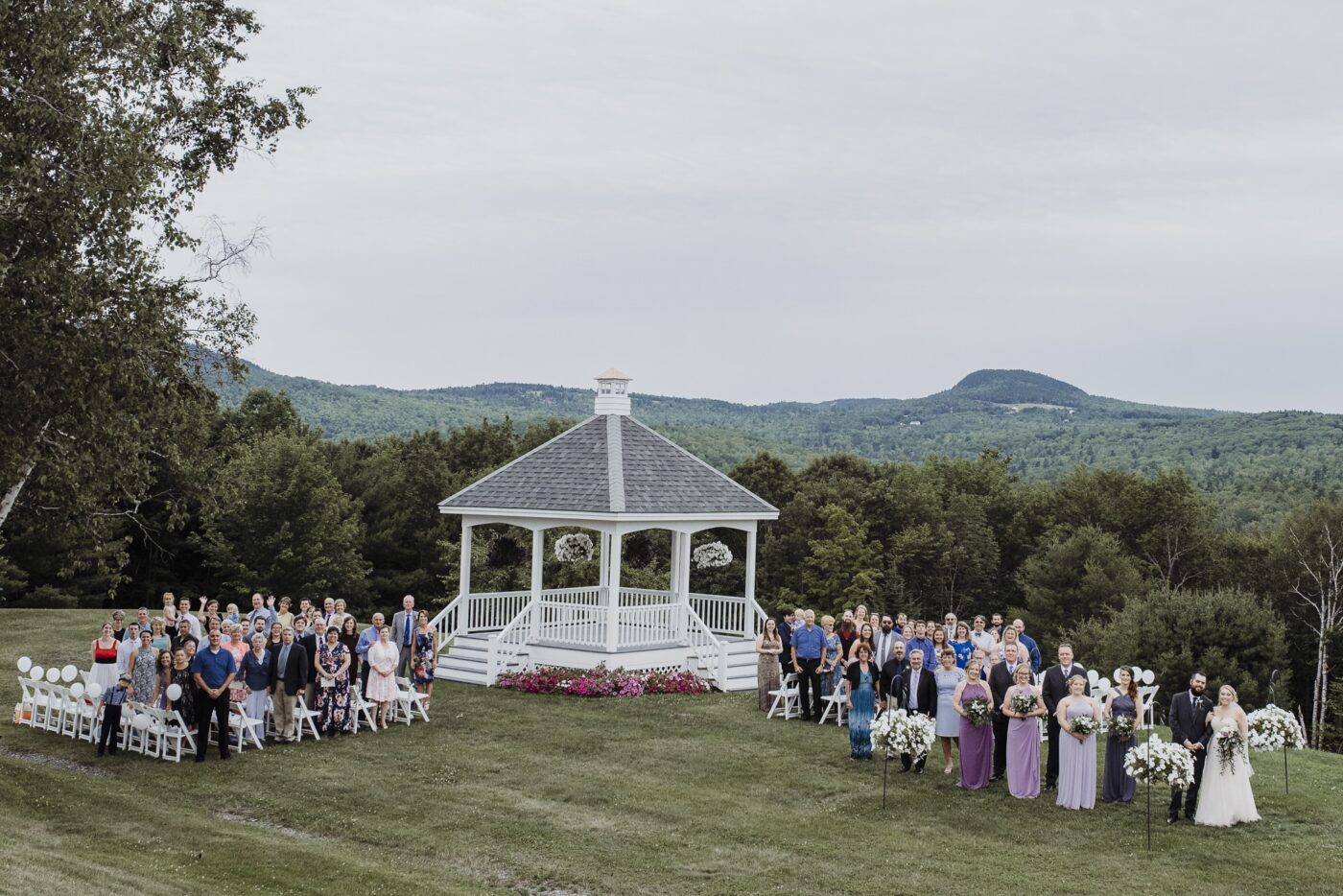 People seated near gazebo at Lucerne Inn Wedding