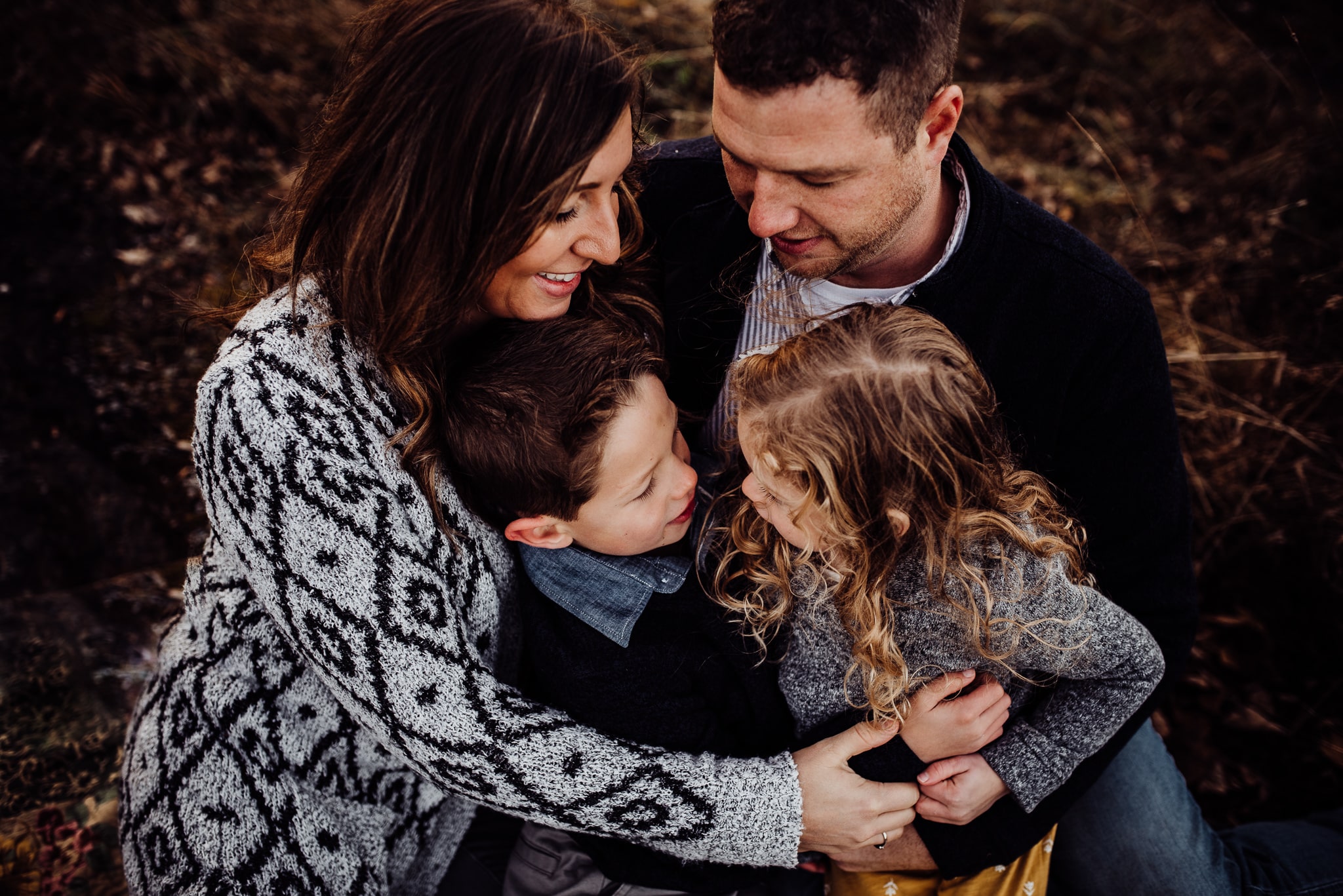 Family looking at each other in coordinated outfits