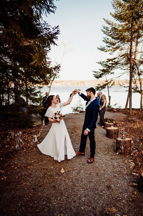 Groom twirling bride at greenville wedding