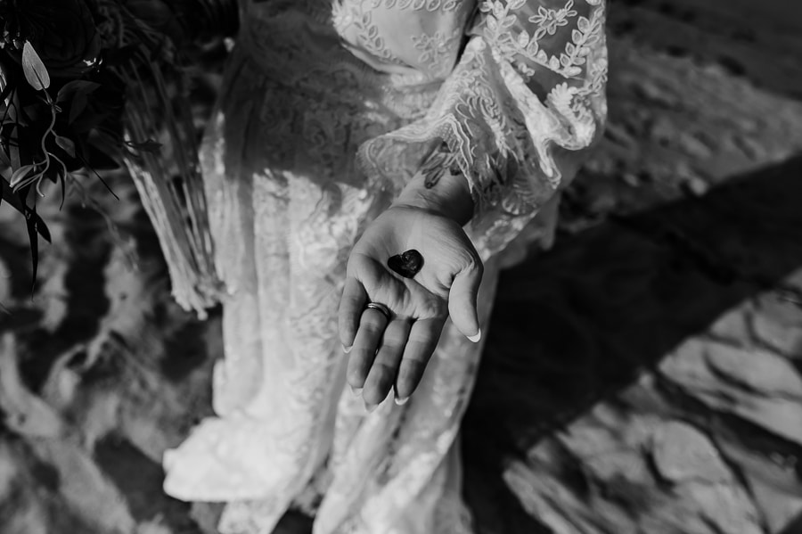 Bride holding heart shaped eucalyptus petal