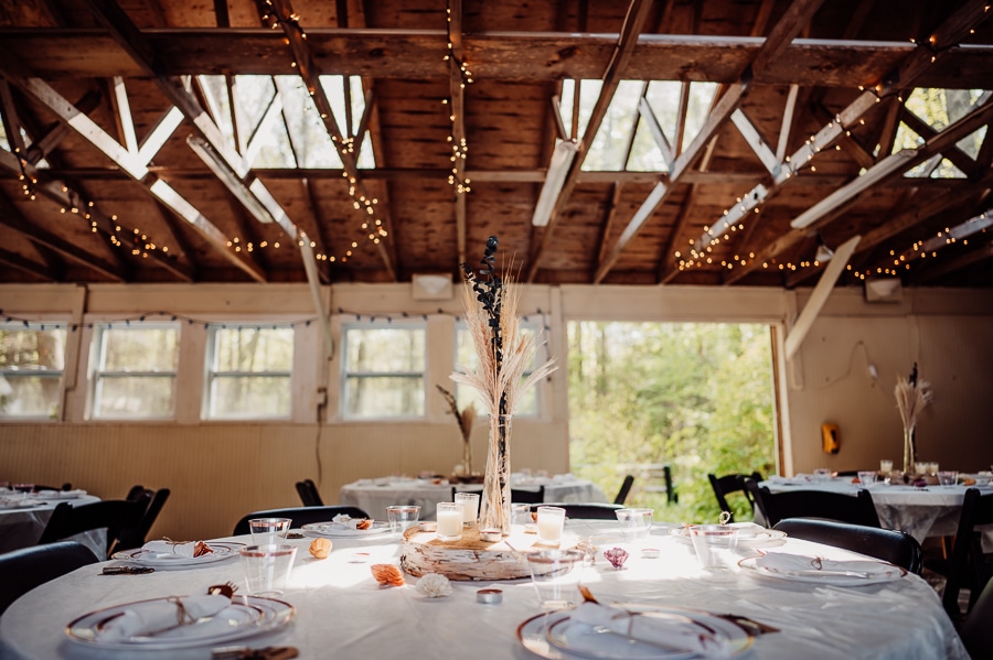 Inside wedding reception area tables