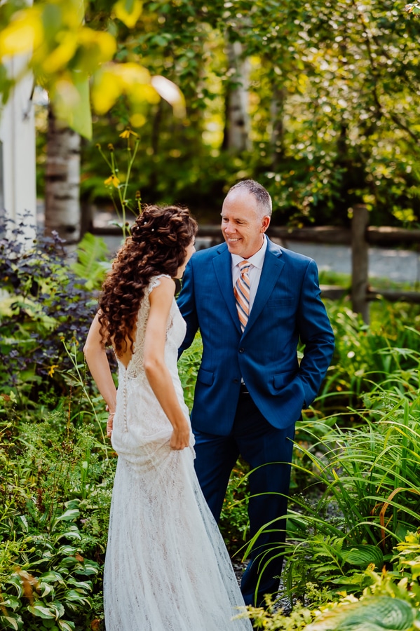 Bride and father first look in front of big moos inn