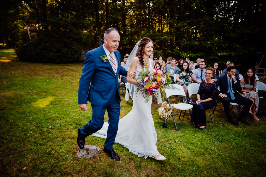 father walking bride down isle at big moose inn