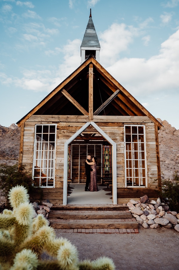 bride and groom inside wedding chapel at nelson ghost town in vegas