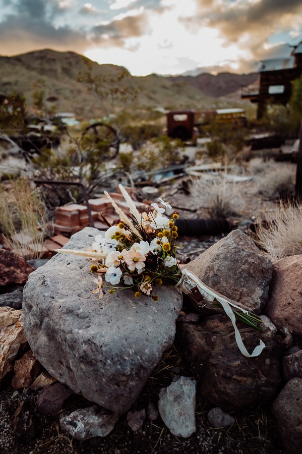 wedding bouquet laying on rocks at nelson ghost town vegas