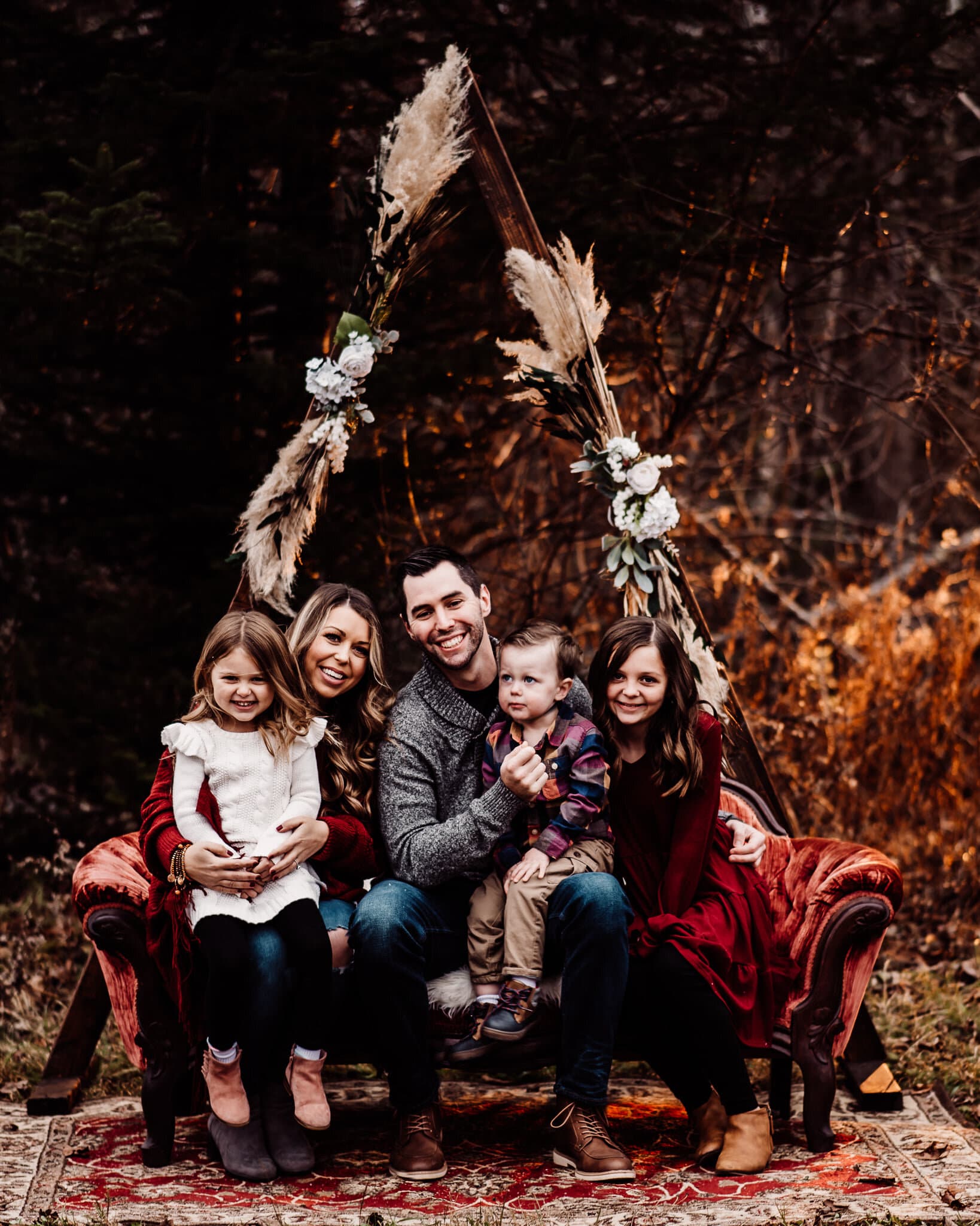 Maine wedding photography elopement bar harbor Acadia national park Christmas winter harvest mini wood triangle arch red velvet sofa