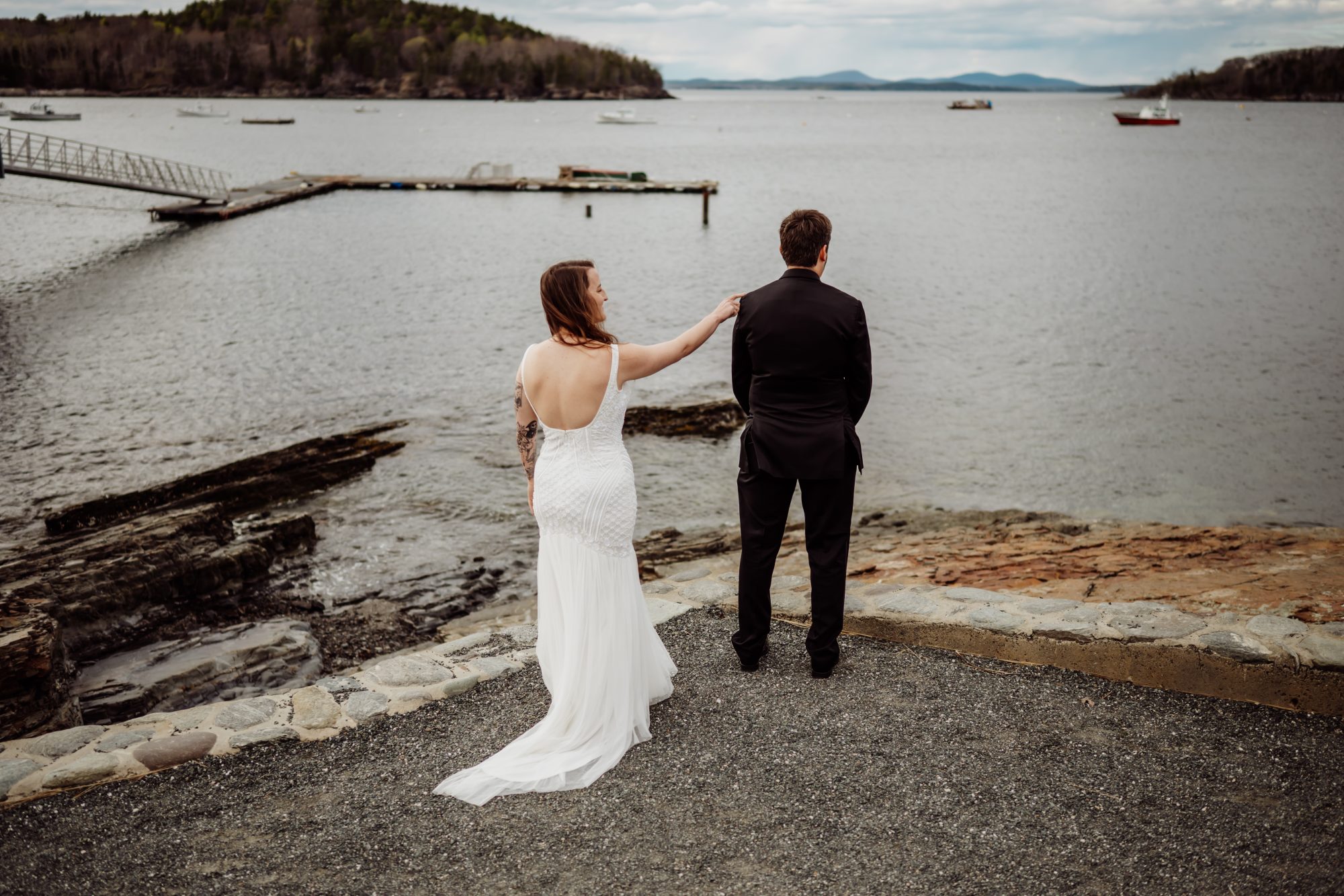 Intimate first look overlooking Frenchman Bay with moody skies and coastal Maine views
